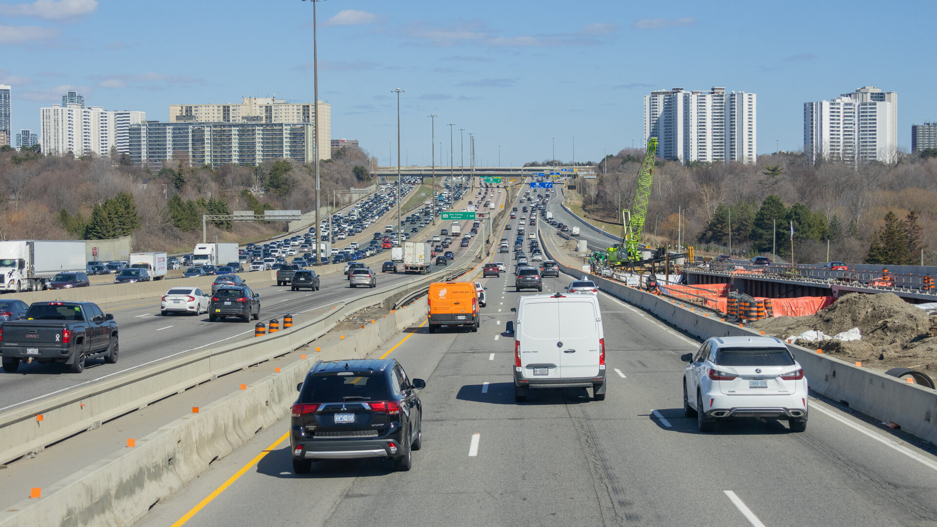 Highway 401 eastbound in North York, Toronto, with active construction on the right shoulder, April 2026.