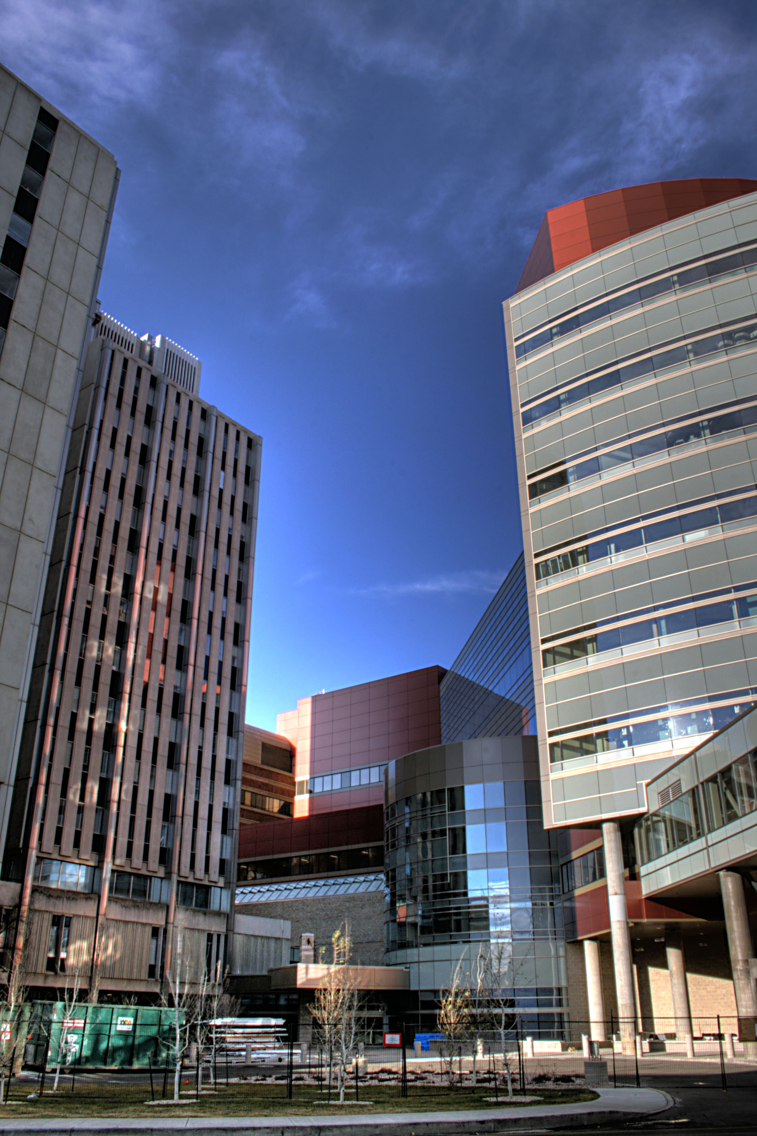 A modern Canadian hospital complex with glass and brick exterior.