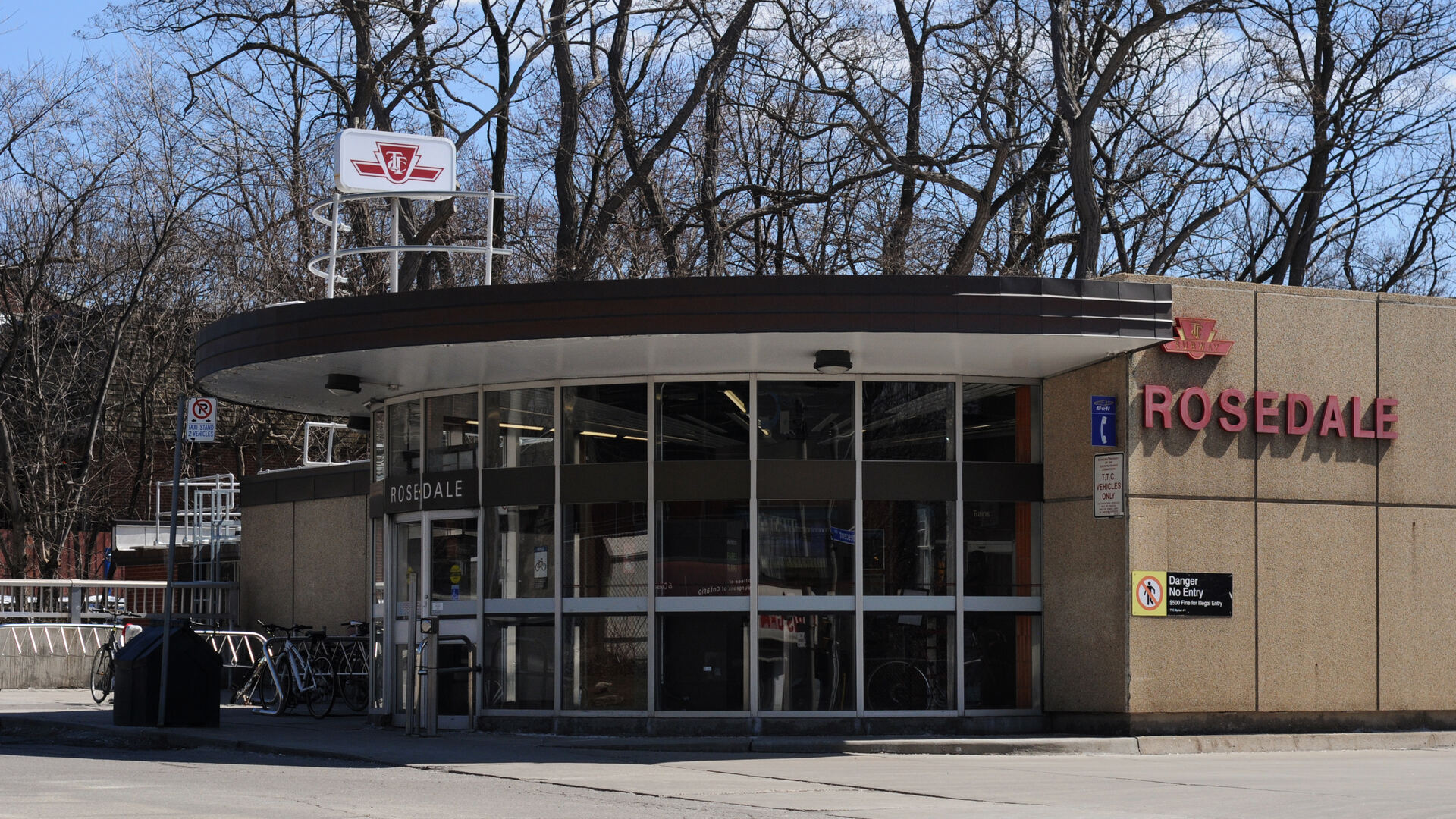 Exterior of Rosedale subway station in Toronto, showing the TTC sign and station entrance.